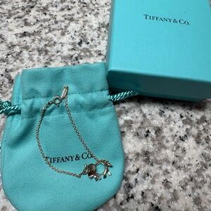 Tiffany & Co. Silver Elephant Charm Bracelet with Blue Pouch
